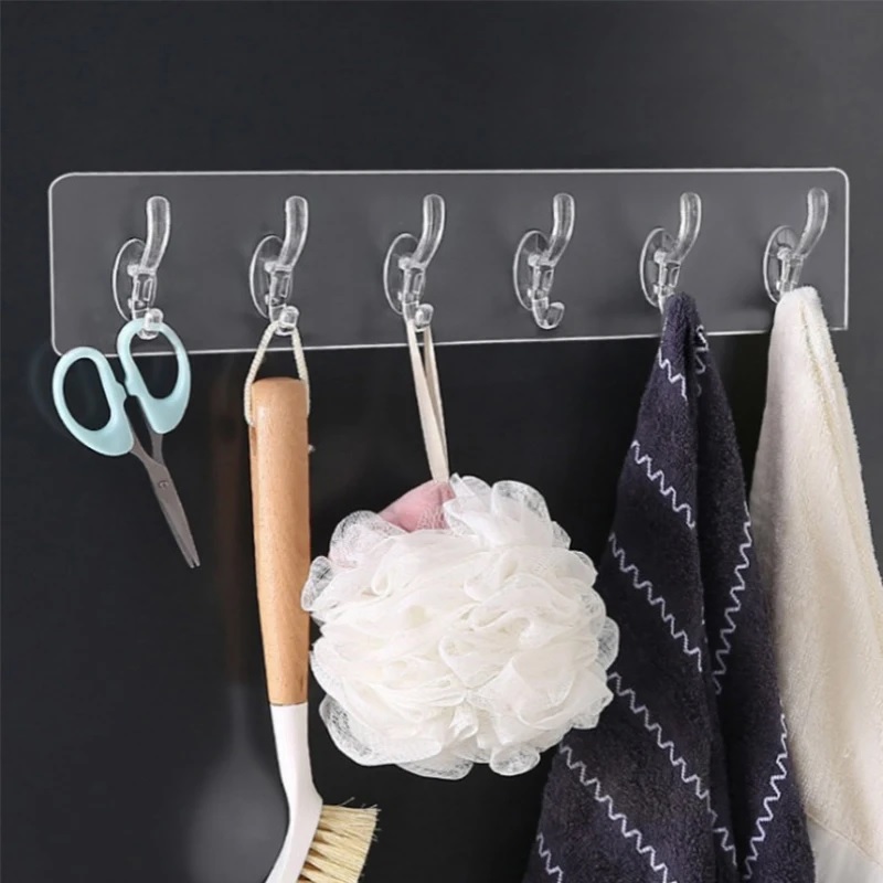 Organize your space easily with this Wall Sticker Cloth Hanger. No drilling required—just stick and use. Perfect for hanging clothes, towels, keys, and kitchen items. Strong, reusable, and easy to install.