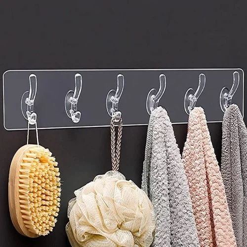 Organize your space easily with this Wall Sticker Cloth Hanger. No drilling required—just stick and use. Perfect for hanging clothes, towels, keys, and kitchen items. Strong, reusable, and easy to install.
